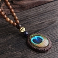 Oval Peacock Feather