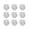 Macro shot of 9 silver round stainless steel pendants with guardian angel engraving - Angel / 20mm