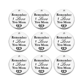 Macro shot of 9 stainless steel round charms engraved with Remember I Love You Mom - Love You Mom / 20mm