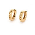 Detail of 18k gold plated huggie earrings featuring champagne zircon gemstone settings - Gold Plated Champagne Zirconia