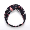 Navy blue elastic headband with pink flamingo print and a stylish twist knot design - Navy Bird