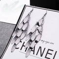 Silver long tassel earrings featuring layered willow leaf metal pendants on a white card - E1501-3 Willow Leaf Layered