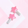 Close-up of pink and green resin star wands for DIY phone cases and crafts decorations - Pink Star Magic Wand