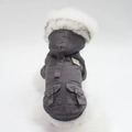 Detail of dark grey dog parka with white faux fur collar and Rock Ride leather logo patch - Dark Gray