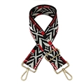 Detailed view of woven geometric bag strap in black white and red with gold metal hardware - Rainbow