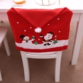 Housses de chaise de Noël avec motifs Père Noël et bonhomme de neige sur chaises blanches - Housse de chaise imprimée à bord rouge