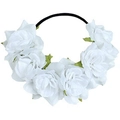 Detailed view of white artificial fabric flowers and green leaves on a slim black headband - White