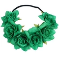Detail of green artificial roses on a black elastic headband for festive hair styling - Green