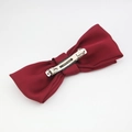 Detail of red oversized satin bow hair clip with silver metal spring fastener and handmade label - Burgundy Hair Clip