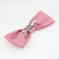 Detailed macro view of pink satin bow hair clip with handmade label and metal spring clip - Korean Pink Hair Clip
