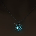 Luminous unicorn necklace with glowing blue orb in a vintage hollow metal pendant - Blue-Green Unicorn