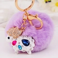 Purple plush fur pompom keychain with crystal-encrusted sheep pendant and gold lobster clasp - White Lamb + Light Purple Pom Pom