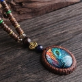 Oval Peacock Eye Feather