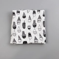 Neutral white muslin baby swaddle blanket with black hand-drawn ice cream pattern - Black and White Ice Cream