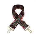 Detail of adjustable woven bag strap with red and white geometric patterns and gold clips - Glamorous Colors