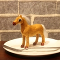 Realistic brown decorative deer figurine with white mane on a ceramic display plate - Plastic/Simulation Fur / Pony