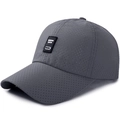 Dark grey mesh baseball cap featuring a black rectangular luck patch in 45-degree view - Dark Gray