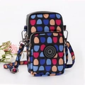 Vertical black canvas phone bag with colorful dot pattern and multi-layer zippers - Blue Color Dots