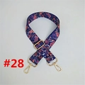 Close-up of ethnic style navy blue replacement bag strap with pink floral weave and gold hooks - #28 Navy Paisley
