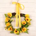 Artificial sunflower heart-shaped wreath on dry rattan with a yellow polka dot ribbon - Sunflower Ribbon Wreath