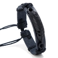Handcrafted black braided leather bracelet featuring a detailed metal feather charm decoration - Black