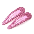 Deux barrettes à cheveux roses pailletées pour filles sur fond blanc - Rose rouge