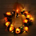 Heart-shaped sunflower wreath with warm LED lights and yellow polka dot ribbon decor - Lighted Sunflower Ribbon Wreath