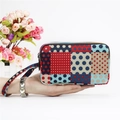 Canvas polka dot wallet for women with multi-layered zippers and a wrist strap - Contrast Color