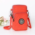 Mini orange nylon crossbody phone bag with multi-layer zippers and adjustable strap - Orange Red