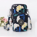 Mini floral crossbody phone bag in black with yellow and white flower prints - Blue Trumpet Flower