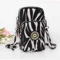 Vertical zebra print mini crossbody phone bag with three zipper compartments and strap - Black Leopard