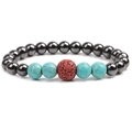 Magnetic hematite bead bracelet with turquoise and volcanic lava stone on white background - Red