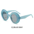 Oversized round blue frame sunglasses with dark grey lenses for a retro fashion look - Blue Frame Grey Lens