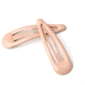 Set of two beige candy-colored oval snap hair clips on a clean white background - Camel