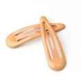 Pair of cream beige candy colored metal BB hair clips for women with glossy finish - Turmeric