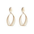 Minimalist gold geometric dangle earrings featuring layered oval rings on white background - Elegant Gold