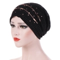 Close-up of black lace turban hat with rose gold rhinestones and sparkling beadwork - M (56-58cm) / Black