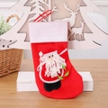 Calza di Natale rossa da 21 cm con Babbo Natale 3D su una superficie in legno festiva - Babbo Natale