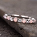 Silver opal engagement ring featuring pink round stone and sparkling white zircons - US 7 / Silver