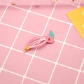 Cute pink bird shaped metal hair clip with blue accents on a soft pink grid background - 5# New Bird