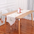 Embroidered Santa table runner with red scalloped edges and tassels for Christmas decor - Christmas Tree