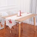 Christmas table runner with Santa Claus embroidery and tassel decor for festive dining - Santa Claus
