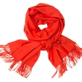 Soft solid red winter scarf with fringe details and a small woven label in a stylish knot - Orange Red