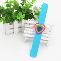 Sky blue silicone slap bracelet featuring a colorful layered heart-shaped accessory - Blue Heart