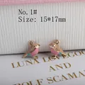 Detail of 15x17mm bird-shaped enamel charms with pink and brown finish for jewelry making - No.1 (Pink Blue Gold)