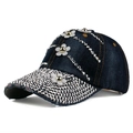 Detail of dark blue denim baseball cap with sparkling silver rhinestones and white floral 3D decor - Adjustable / Dark Denim Blue