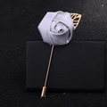 Elegant grey silk rose brooch with golden long pin and hollow leaf detail on black - Silver Grey