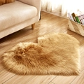 Camel heart-shaped plush faux fur rug in a cozy living room bedroom setting - Khaki