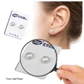Classic 7mm white half pearl magnetic stud earring shown in macro and on-ear view - Half Pearl