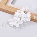 Detail of bridal hair clip with white shell flowers, pearls and crystals on silver wire - Silver Wire White Flower